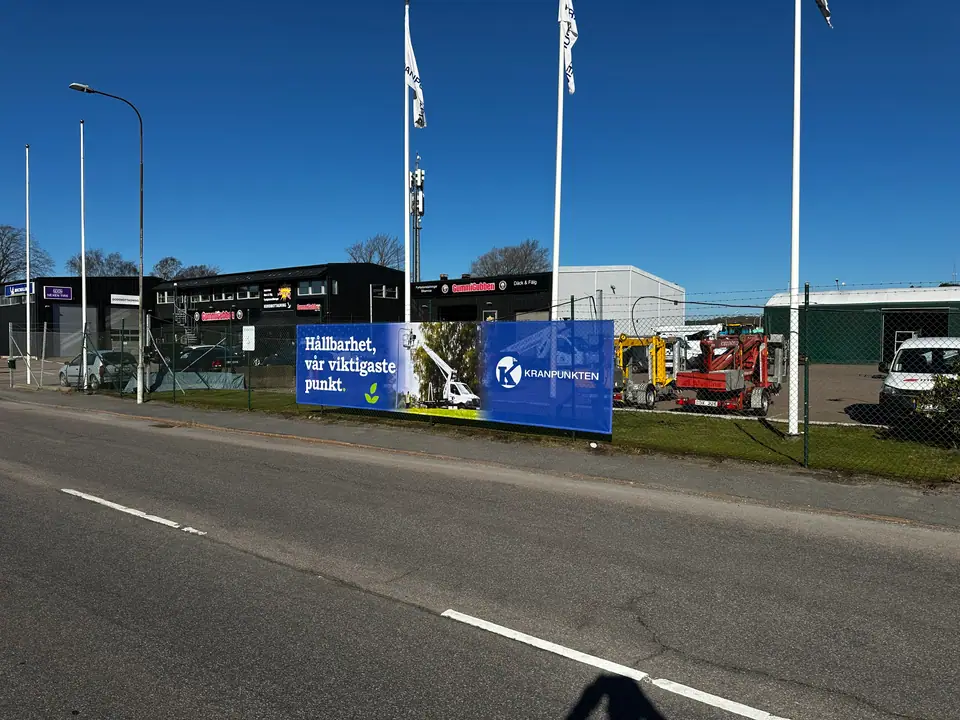 Kranpunkten banderoll på staket